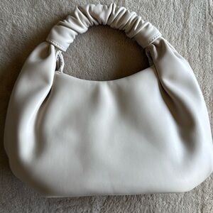 Cream mini handbag by The Drop